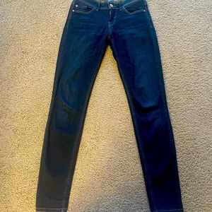 GUESS skinny jeans.